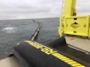 Oliekerend scherm op de Noordzee vanuit de m.s. Arca