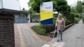 Blinde vrouw met stok