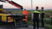 Automobilist te water in Midwoud3