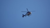 Politiehelicopter zoekt naar dader overval op Albert Heijn aan de Dorpsstraat in Zwaag
