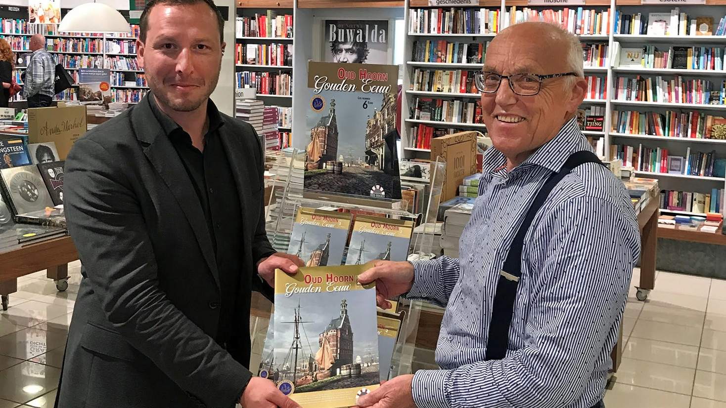 Uitreiking magazine Gouden eeuw aan Wethouder