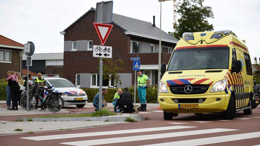 Jongen op Keern van fiets af geslagen