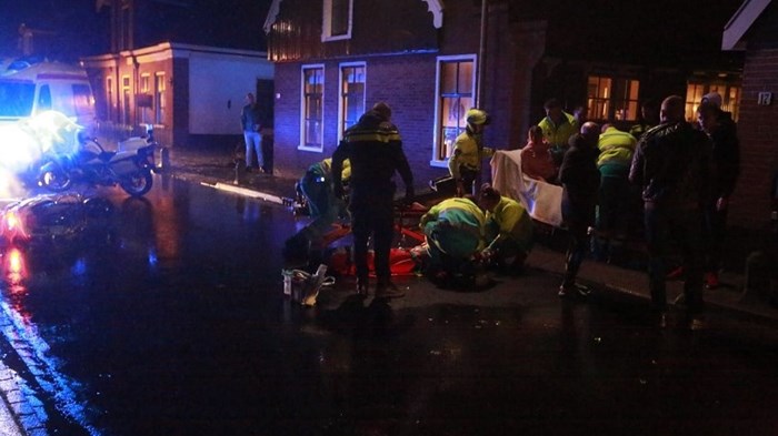 Scooter en bijrijder ten val 5