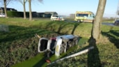 Auto te water bij botsing (Venhuizen)