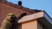 Brandweer redt kat uit dakgoot5