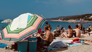 Aan het strand in het buitenland